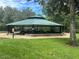 Community picnic pavilion with tables and benches at 8692 Crested Eagle Pl, Sanford, FL 32771
