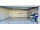 Spacious garage with built-in shelving and storage at 110 Lake Tracy Ct, Haines City, FL 33844