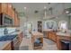 Modern kitchen with stainless steel appliances and an island at 32313 Oak Canopy Dr, Sorrento, FL 32776