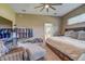 Relaxing main bedroom with king-size bed and walk-in closet at 32313 Oak Canopy Dr, Sorrento, FL 32776