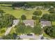 Aerial view of houses and lots in a residential community at 32313 Oak Canopy Dr, Sorrento, FL 32776