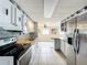 Updated kitchen with stainless steel appliances and wood countertops at 34035 Linda Ln, Leesburg, FL 34788