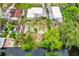 Aerial view of waterfront property with multiple buildings at 34035 Linda Ln, Leesburg, FL 34788