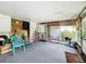Screened porch with view of backyard at 34035 Linda Ln, Leesburg, FL 34788