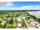Aerial view of waterfront community with lake access at 34035 Linda Ln, Leesburg, FL 34788