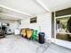 Enclosed back patio with laundry area and storage space at 34035 Linda Ln, Leesburg, FL 34788