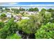 Aerial view of waterfront community with lake and canal at 34035 Linda Ln, Leesburg, FL 34788