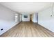Spacious living area with light walls and vinyl flooring at 34035 Linda Ln, Leesburg, FL 34788