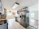 Bright kitchen with stainless steel appliances and an island at 34035 Linda Ln, Leesburg, FL 34788