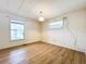 Bright bedroom with light flooring and window at 34035 Linda Ln, Leesburg, FL 34788