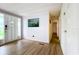 Spacious living room with light walls and wood-look floors at 34035 Linda Ln, Leesburg, FL 34788