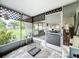 Screened porch with dog cage and door at 34035 Linda Ln, Leesburg, FL 34788