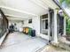 Enclosed back patio with laundry area and storage space at 34035 Linda Ln, Leesburg, FL 34788