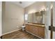 Bathroom with double vanity, neutral colors, and a shower at 131 Costa Mesa Dr, The Villages, FL 32159