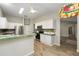 Modern kitchen with stainless steel appliances and green countertops at 131 Costa Mesa Dr, The Villages, FL 32159