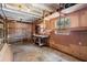 Workshop with shelving and workbench, great for storage at 6919 Fern Cir, Leesburg, FL 34748