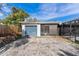 Single car garage with screen enclosure and driveway at 6919 Fern Cir, Leesburg, FL 34748