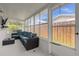 Relaxing screened porch with comfortable seating at 37102 Oak Ln, Umatilla, FL 32784