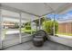 Spacious screened porch overlooking backyard at 37102 Oak Ln, Umatilla, FL 32784