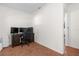 Home office features a large desk, comfortable chair, and ample space for two monitors at 37102 Oak Ln, Umatilla, FL 32784