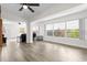 Bright living room with hardwood floors and access to backyard at 37102 Oak Ln, Umatilla, FL 32784