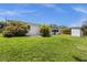 House with a spacious backyard and storage shed at 37102 Oak Ln, Umatilla, FL 32784