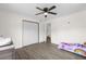 Bedroom with hardwood floors and double door closet at 37102 Oak Ln, Umatilla, FL 32784