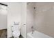 Bathroom with bathtub and shower, toilet and ample storage at 37102 Oak Ln, Umatilla, FL 32784