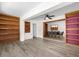 Open dining room with built-in shelving and hardwood floors at 37102 Oak Ln, Umatilla, FL 32784