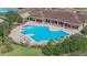 Resort-style pool with ample lounge chairs and a lap pool at 3603 Solana Cir # B, Clermont, FL 34711