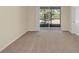 Bedroom with sliding glass doors leading to a patio at 3603 Solana Cir # B, Clermont, FL 34711