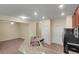 Open kitchen with granite island and stainless steel appliances at 3603 Solana Cir # B, Clermont, FL 34711