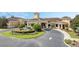 Elegant clubhouse entrance with fountain at 3603 Solana Cir # B, Clermont, FL 34711