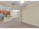 Spacious dining area with access to kitchen and living room at 3603 Solana Cir # B, Clermont, FL 34711