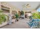 Bright and airy screened porch, perfect for relaxing and enjoying the outdoors at 8084 Se 175Th Malmaison St, The Villages, FL 32162