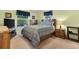 Guest bedroom with a dresser and TV at 8084 Se 175Th Malmaison St, The Villages, FL 32162