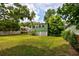 Spacious backyard with shed and green grass at 348 E 10Th Ave, Mount Dora, FL 32757