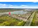 Aerial view of the home's location by the lake at 1103 White Water Bay Dr, Groveland, FL 34736