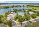 Resort-style community pool, tennis courts, and playground with lake views at 1103 White Water Bay Dr, Groveland, FL 34736