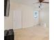 Simple bedroom with a small window at 1103 White Water Bay Dr, Groveland, FL 34736
