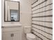 Small bathroom with shower and toilet at 1103 White Water Bay Dr, Groveland, FL 34736