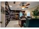 Spacious home office with built-in bookshelves at 6779 Clayton St, Mount Dora, FL 32757
