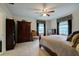 Bright bedroom with ample space and wood furniture at 6779 Clayton St, Mount Dora, FL 32757
