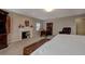 Main bedroom features a fireplace and built-in desk at 6779 Clayton St, Mount Dora, FL 32757