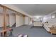 Spacious basement with comfortable seating and access to other rooms at 6779 Clayton St, Mount Dora, FL 32757