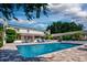 Resort-style pool and patio, ideal for entertaining at 6779 Clayton St, Mount Dora, FL 32757