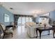 Living room with fireplace and access to backyard at 6779 Clayton St, Mount Dora, FL 32757