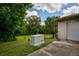 Generac generator for backup power in the backyard at 6779 Clayton St, Mount Dora, FL 32757