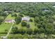 Spacious property with large house, pool, and lush surroundings at 6779 Clayton St, Mount Dora, FL 32757