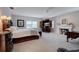 Large main bedroom with fireplace and sitting area at 6779 Clayton St, Mount Dora, FL 32757